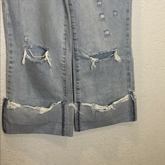 Alice + Olivia Light Blue Distressed Wide-Leg Jeans